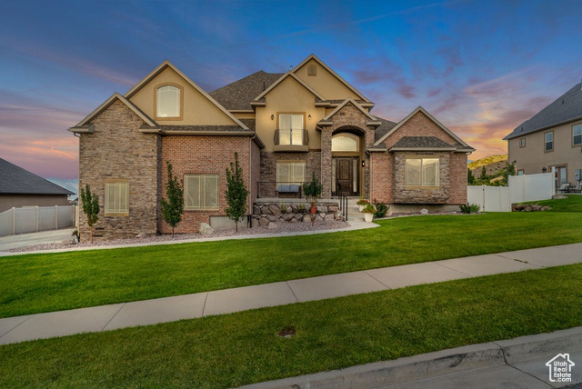 14329 South Knapper Rdg Cove Herriman, UT 84096 - Photo 1 of 1 View of front facade featuring stucco siding