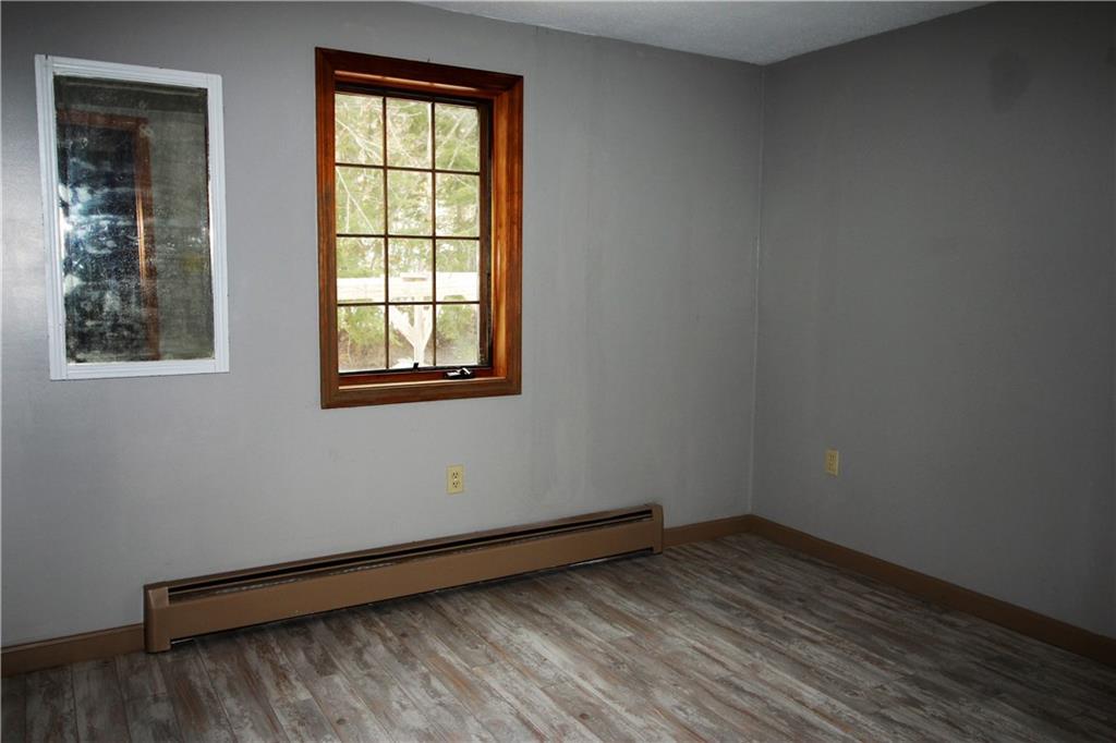 483 Lake House Road Naples, ME 04055 - Photo 14 of 33 1st floor bedroom