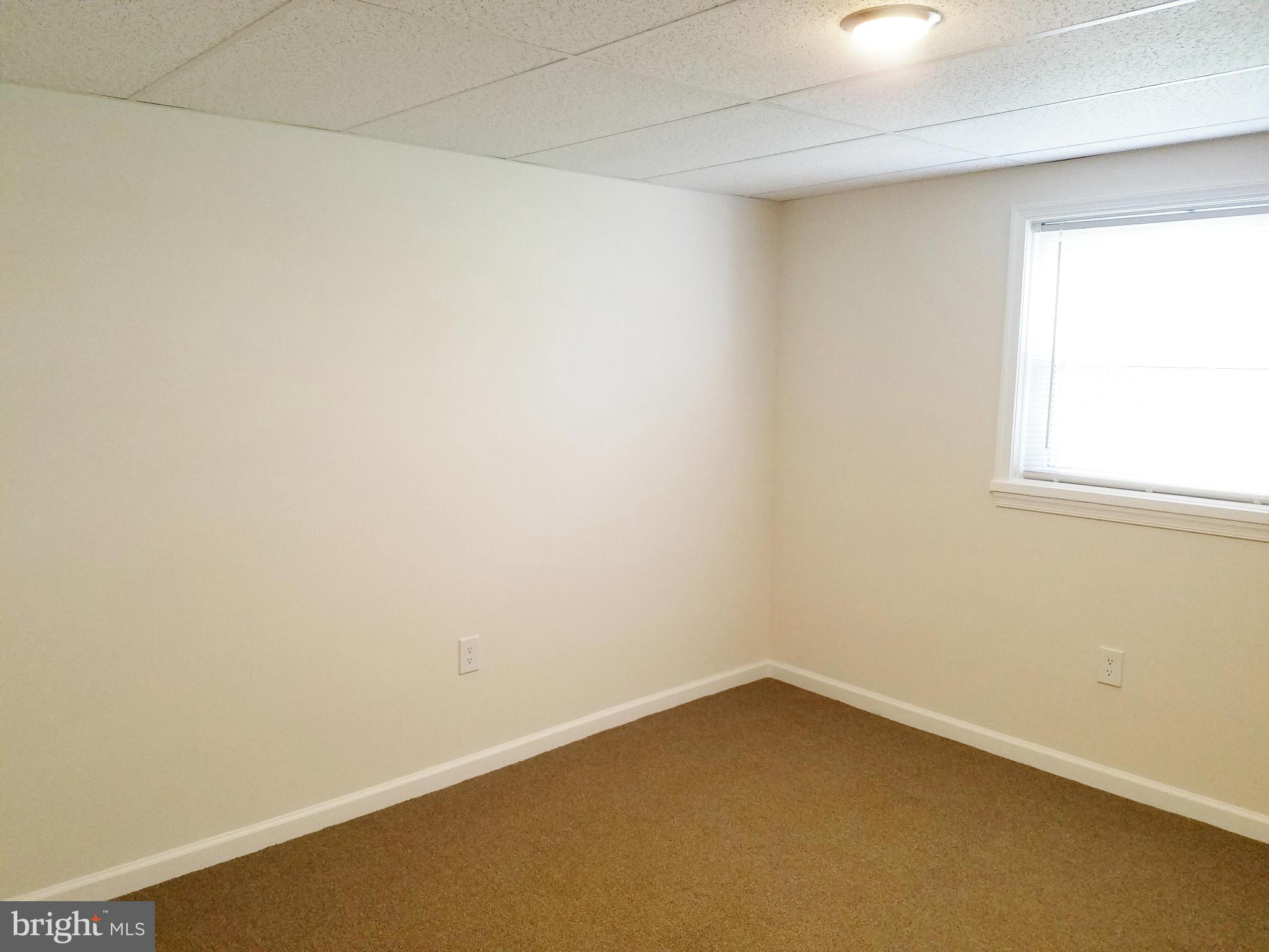 12908 Glynis Road Clinton, MD 20735 - Photo 26 of 30 an empty room with a window