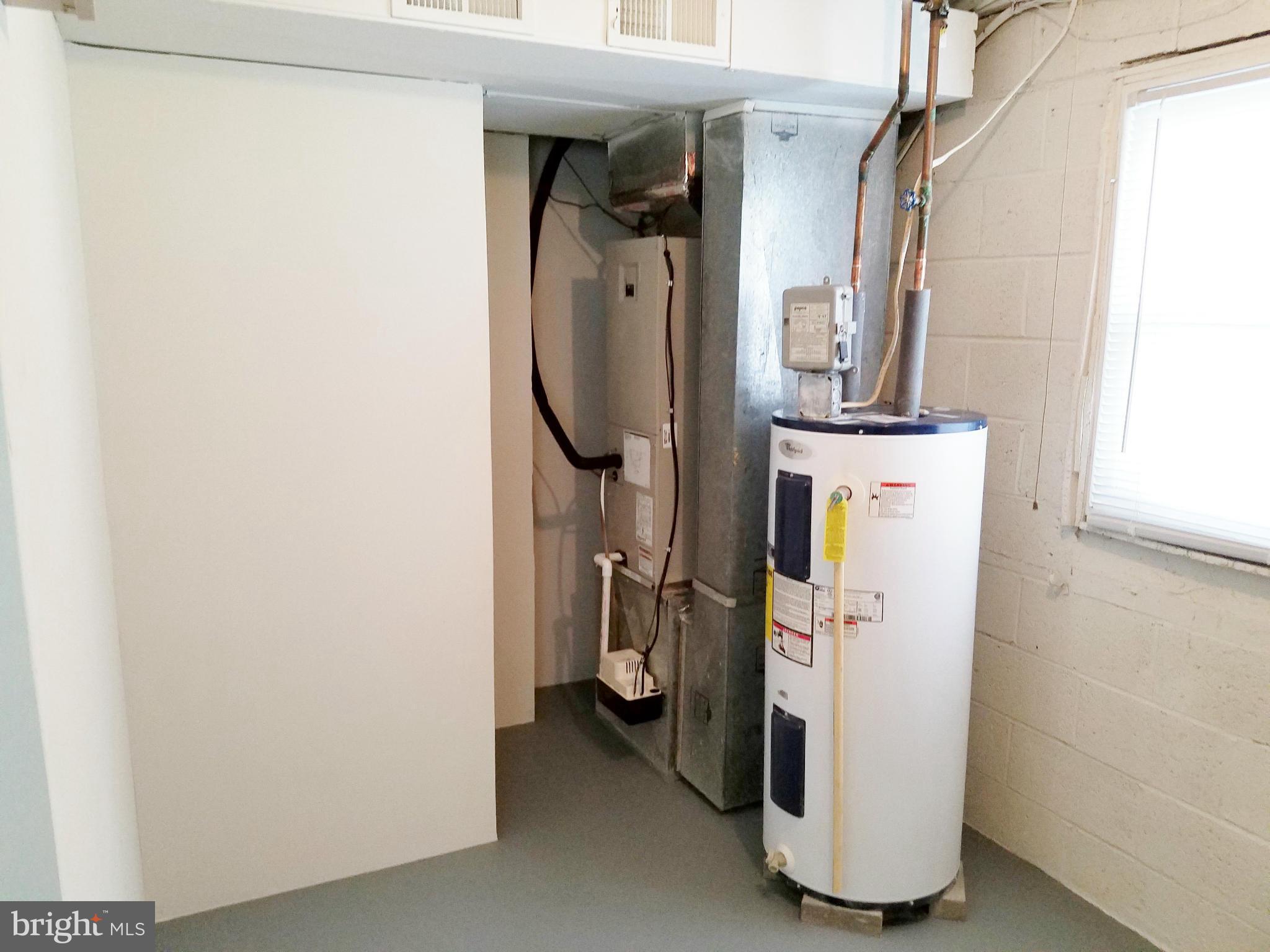 12908 Glynis Road Clinton, MD 20735 - Photo 29 of 30 a utility room with dryer and washer