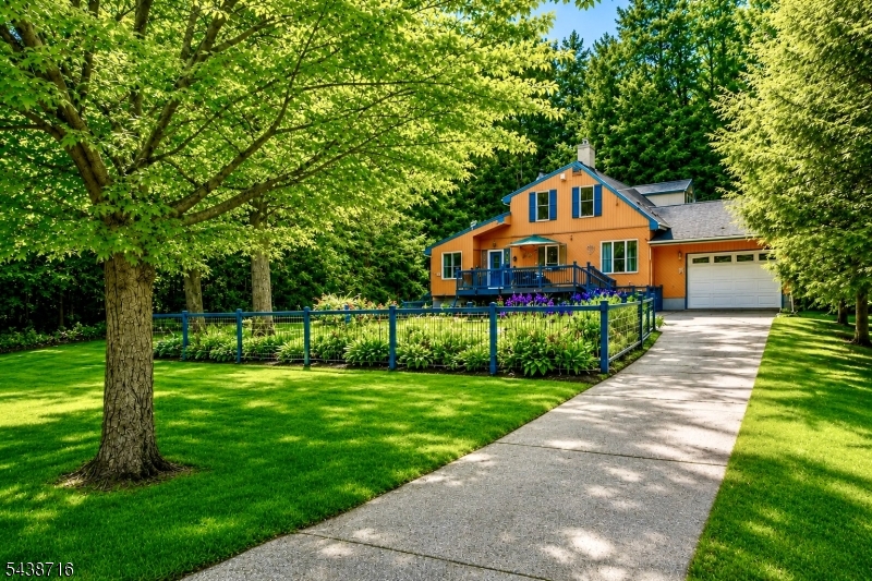 11 Rippling Brook Drive Vernon, NJ 07422 - Photo 2 of 49 a front view of a house with a yard and trees