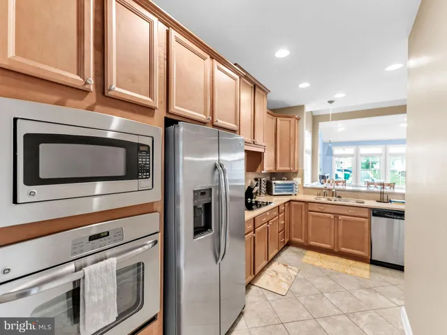 a kitchen with lots of counter top space and a sink