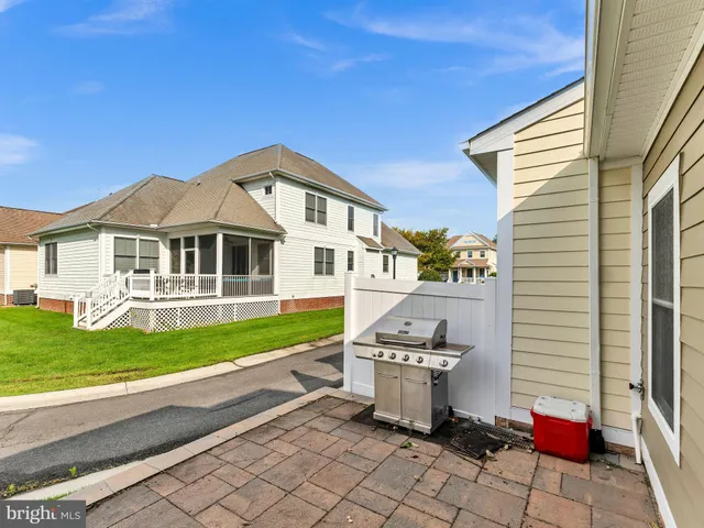 a bed room with a bed and a book shelf