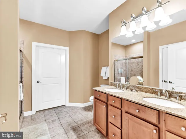 a bed room with a bed and a window