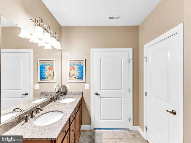 a view of a two chairs in the balcony