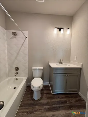 a bathroom with a sink toilet a shower and bathtub