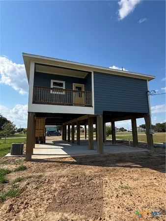 a front view of a house with balcony