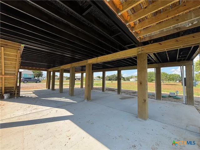 a view of balcony with wooden floor