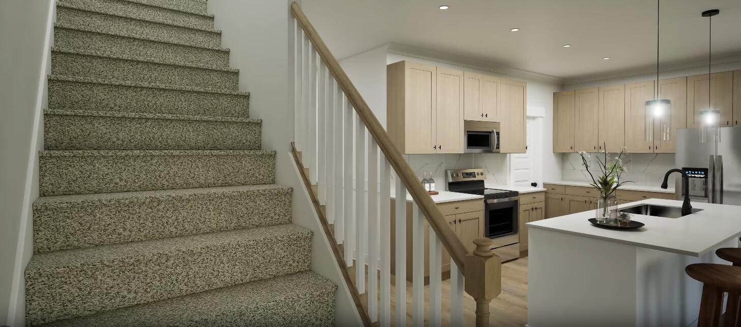 98 Sagebrush Drive Freeport, FL 32439 - Photo 24 of 30 a view of a kitchen with cabinets and stainless steel appliances