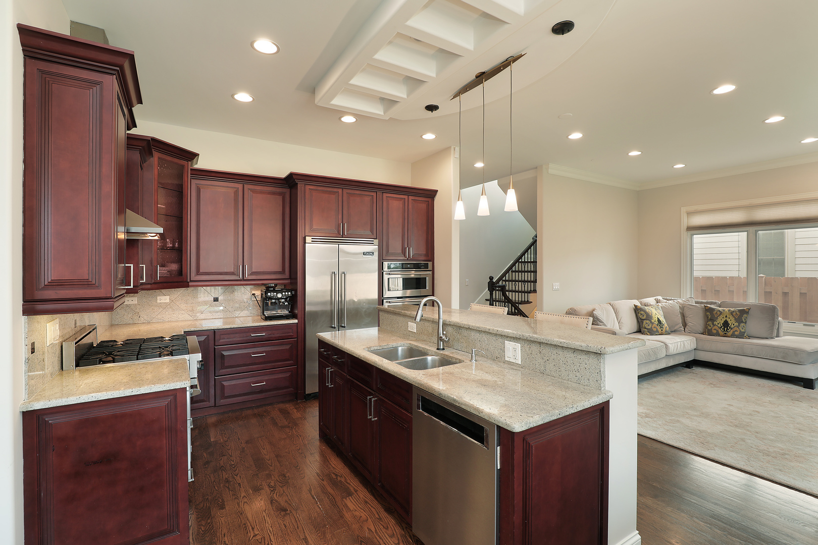 2026 Maple Avenue Northbrook, IL 60062 - Photo 5 of 18 a kitchen with kitchen island a sink stove and refrigerator