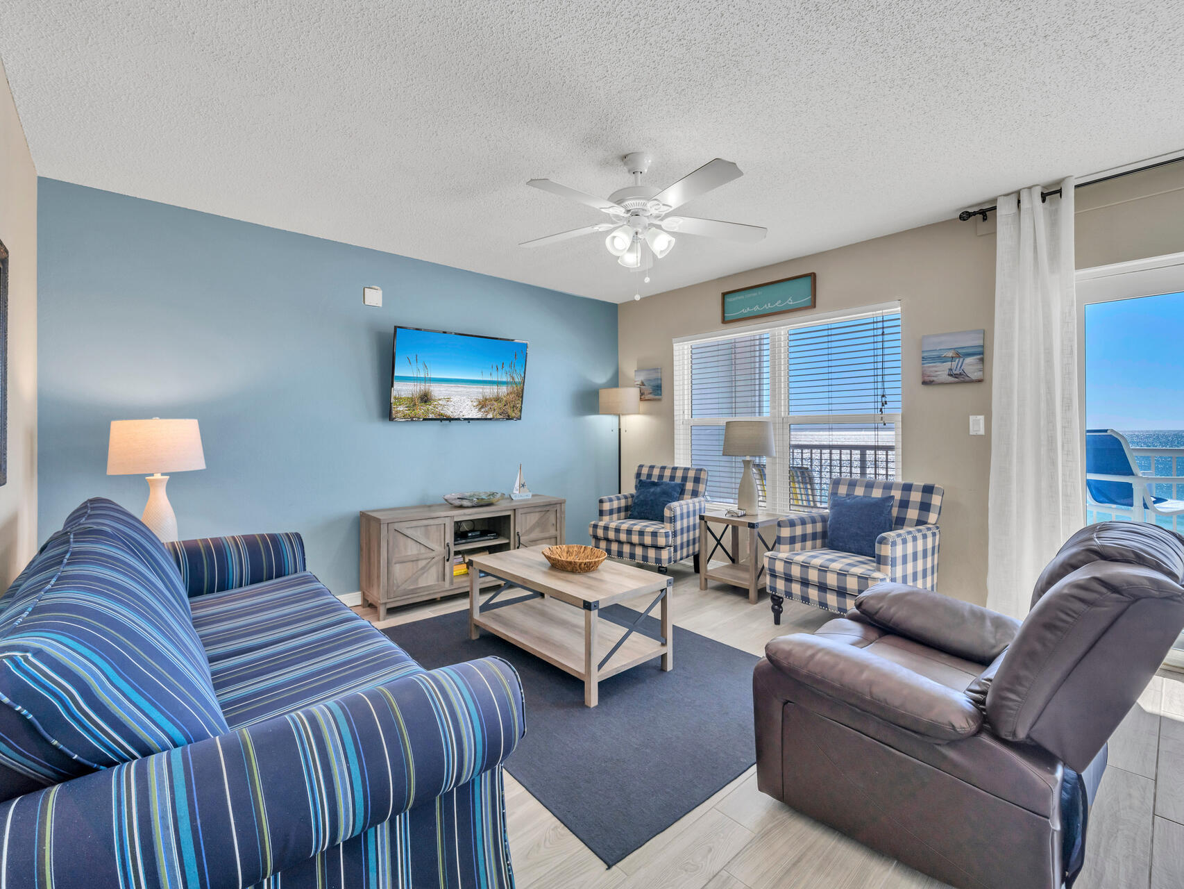 790 Santa Rosa Boulevard, Unit 6002 Fort Walton Beach, FL 32548 - Photo 12 of 42 a living room with furniture ceiling fan and a lamp