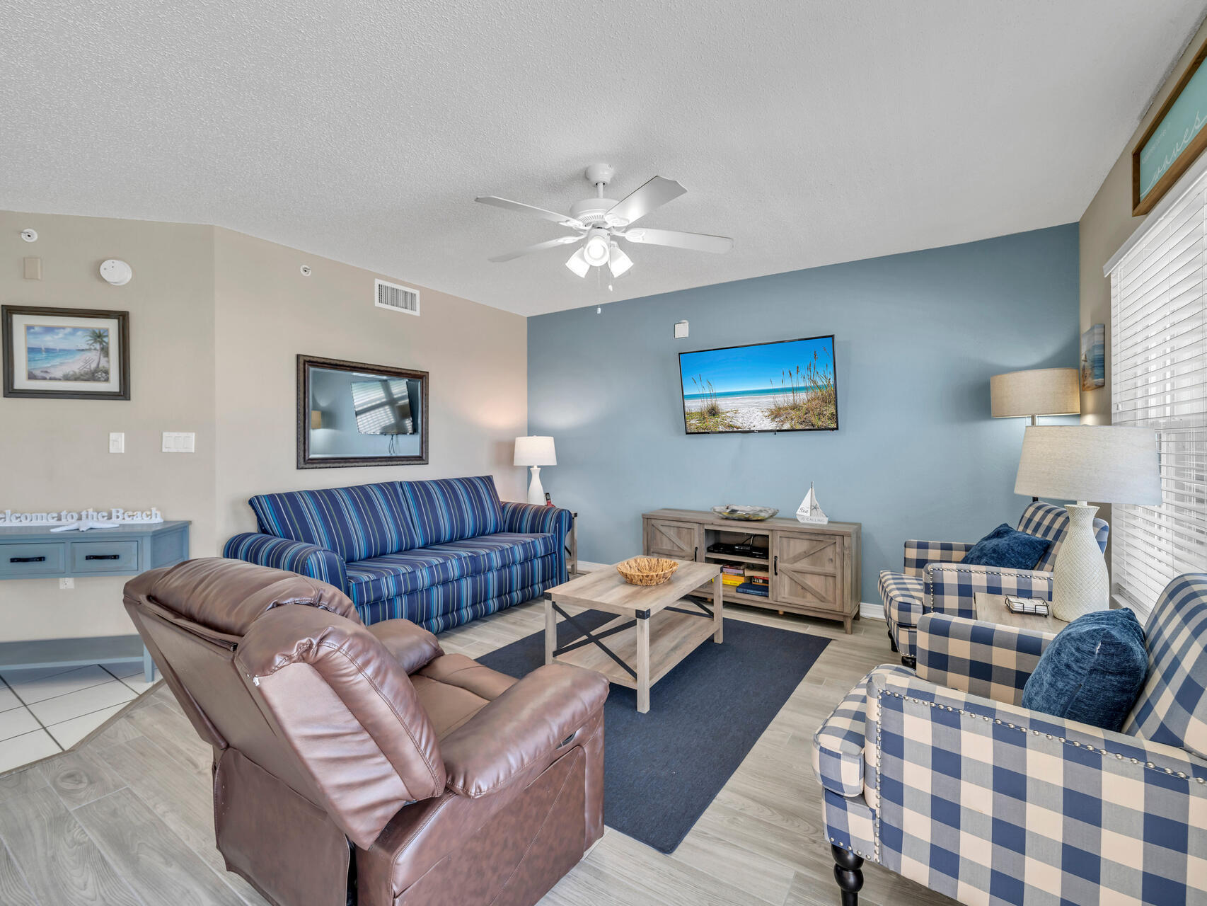 790 Santa Rosa Boulevard, Unit 6002 Fort Walton Beach, FL 32548 - Photo 13 of 42 a living room with furniture ceiling fan and a window