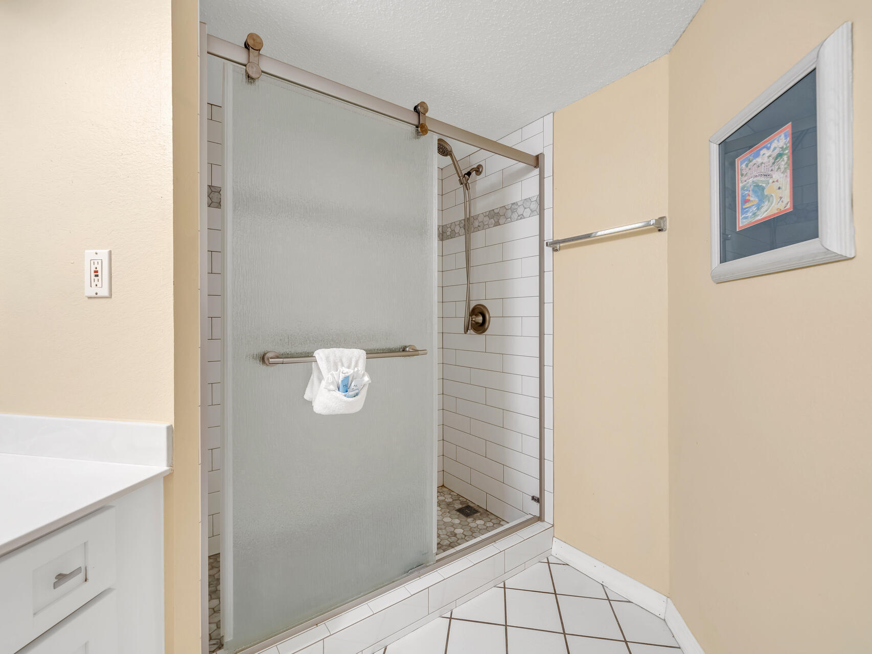 790 Santa Rosa Boulevard, Unit 6002 Fort Walton Beach, FL 32548 - Photo 21 of 42 a bathroom with a shower and mirror