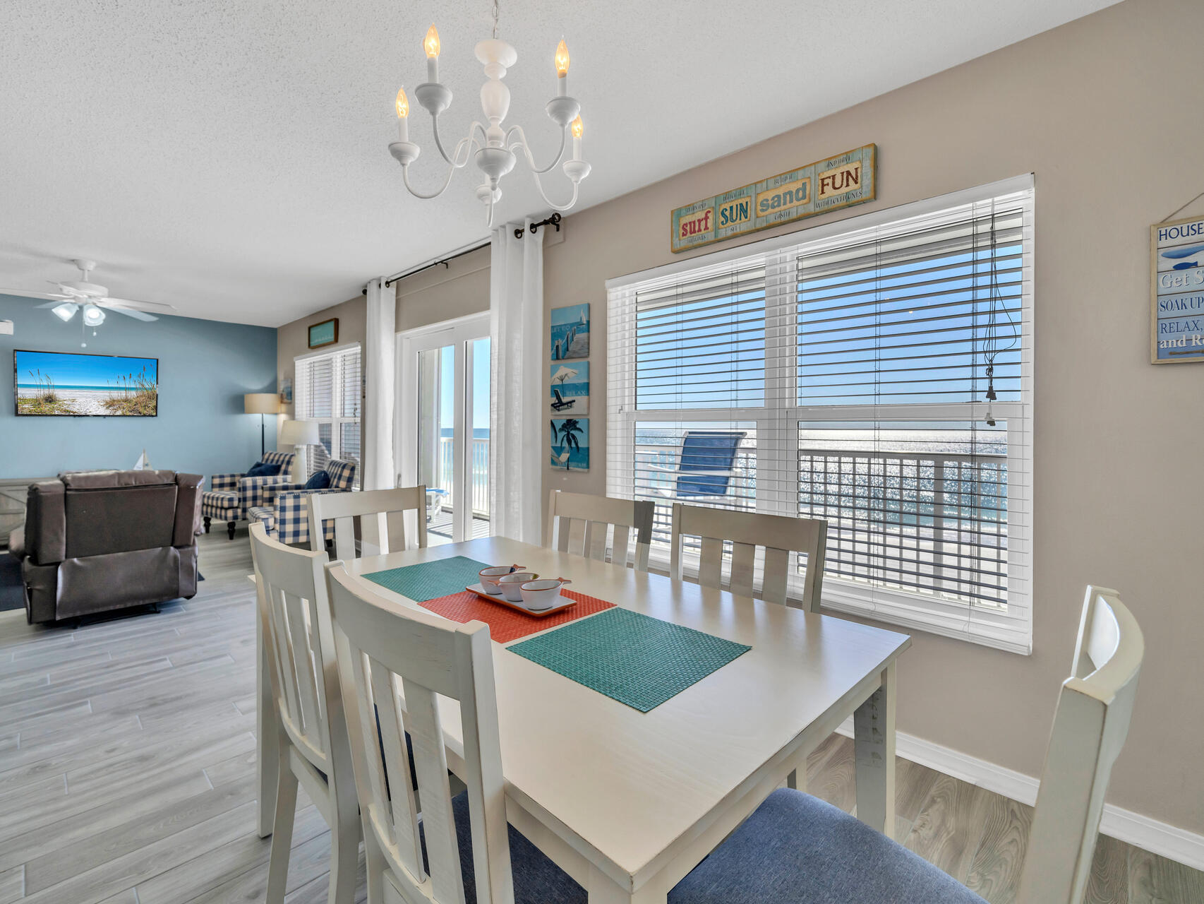 790 Santa Rosa Boulevard, Unit 6002 Fort Walton Beach, FL 32548 - Photo 10 of 42 a view of a dining room with furniture window and wooden floor