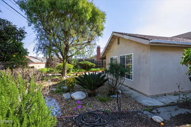 a house view with a outdoor space
