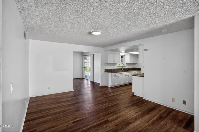 a view of kitchen with wooden floor