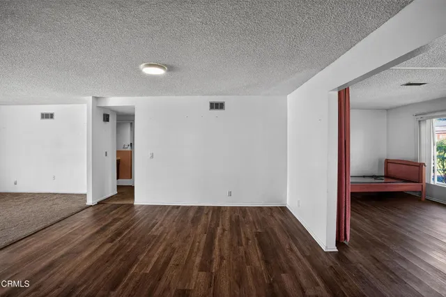 a view of livingroom with furniture and wooden floor
