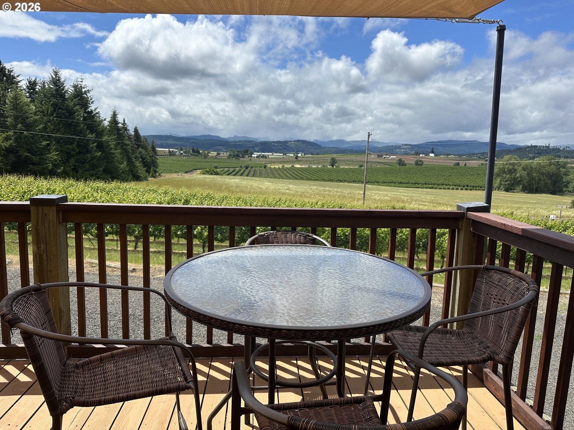 18700 Northwest Adcock Road Yamhill, OR 97148 - Photo 40 of 42 a view of a chairs and table in the balcony