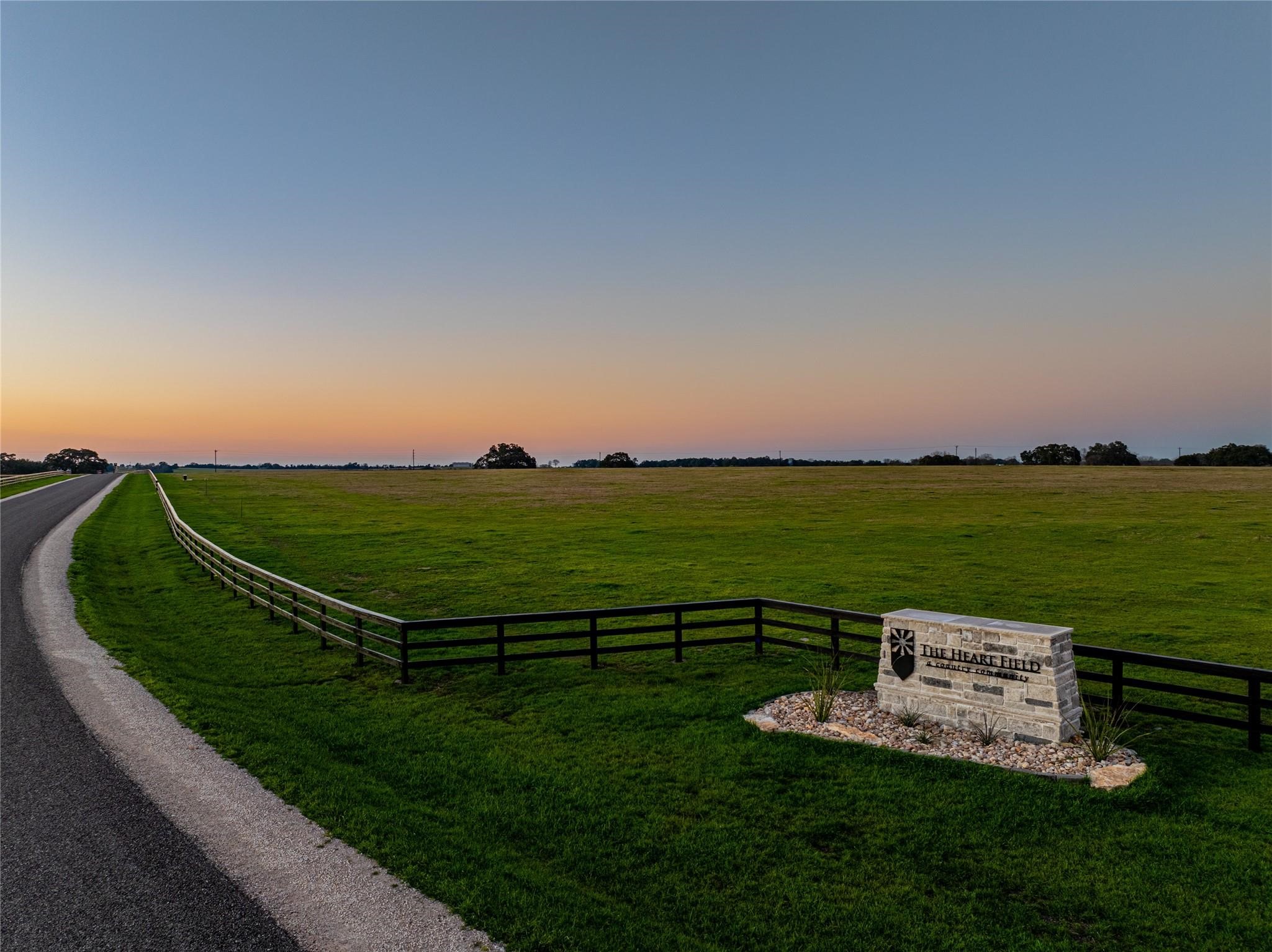 108 Hartfield Road Round Top, TX 78954 - Photo 10 of 17 a view of a lake with a big yard