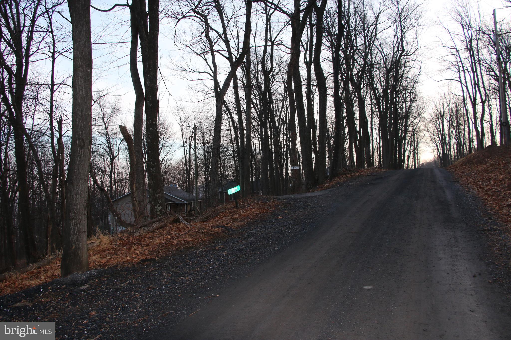 Windy Way Front Royal, VA 22630 - Photo 11 of 18 a backyard of a house with lots of green space and outdoor seating