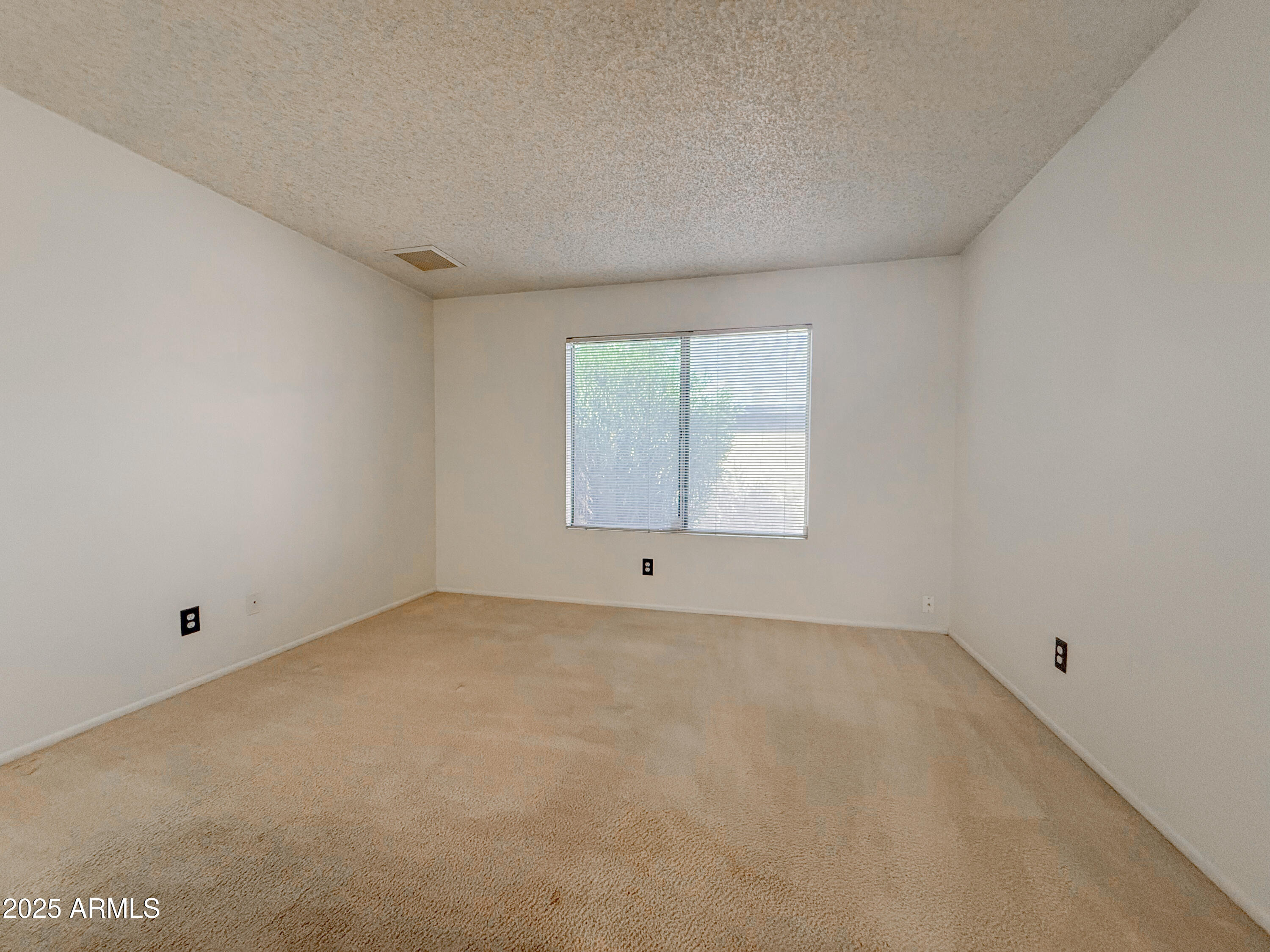 850 West Duke Drive Tempe, AZ 85283 - Photo 14 of 18 an empty room with a window