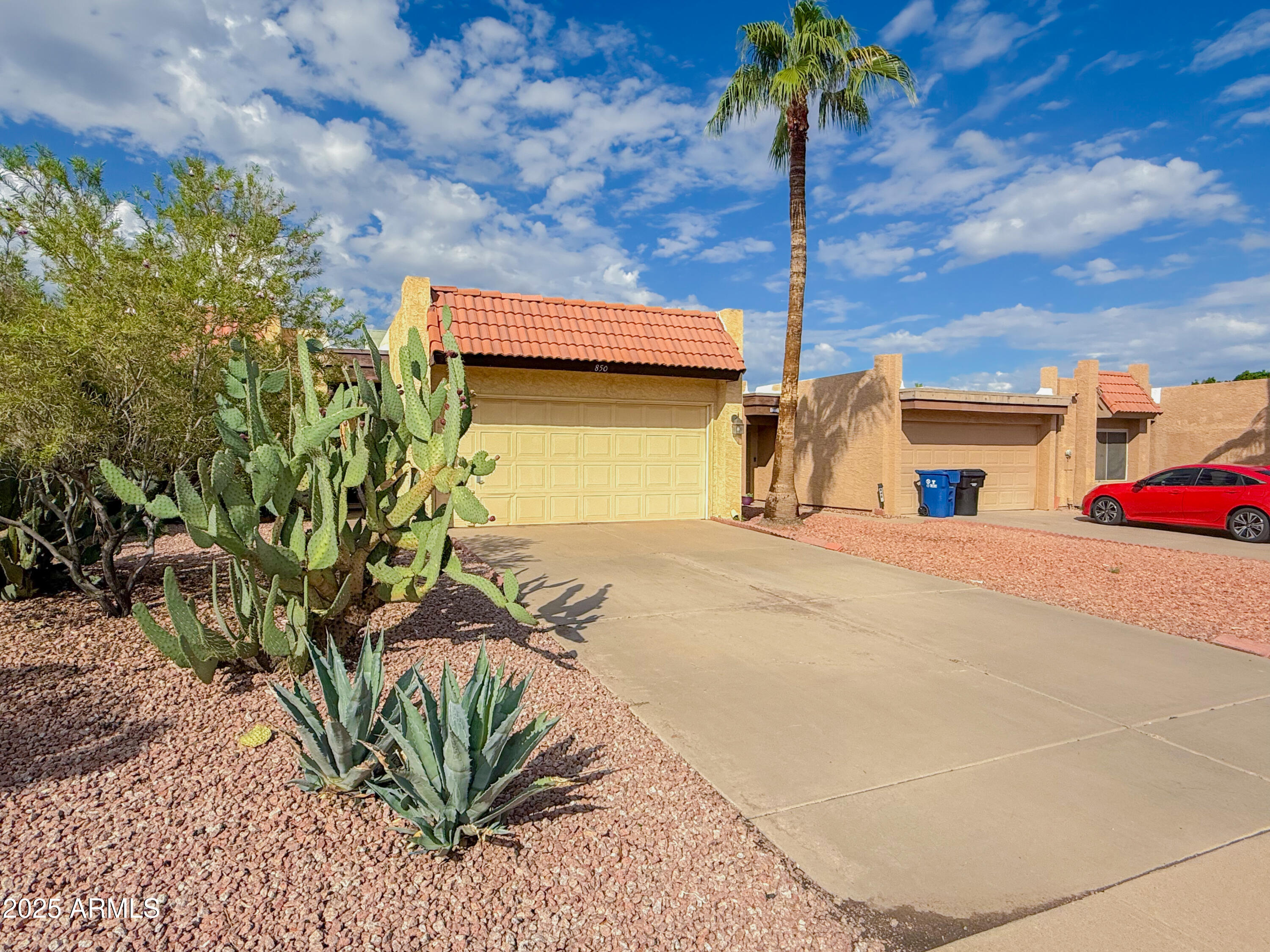850 West Duke Drive Tempe, AZ 85283 - Photo 3 of 18 a front view of a house with a yard