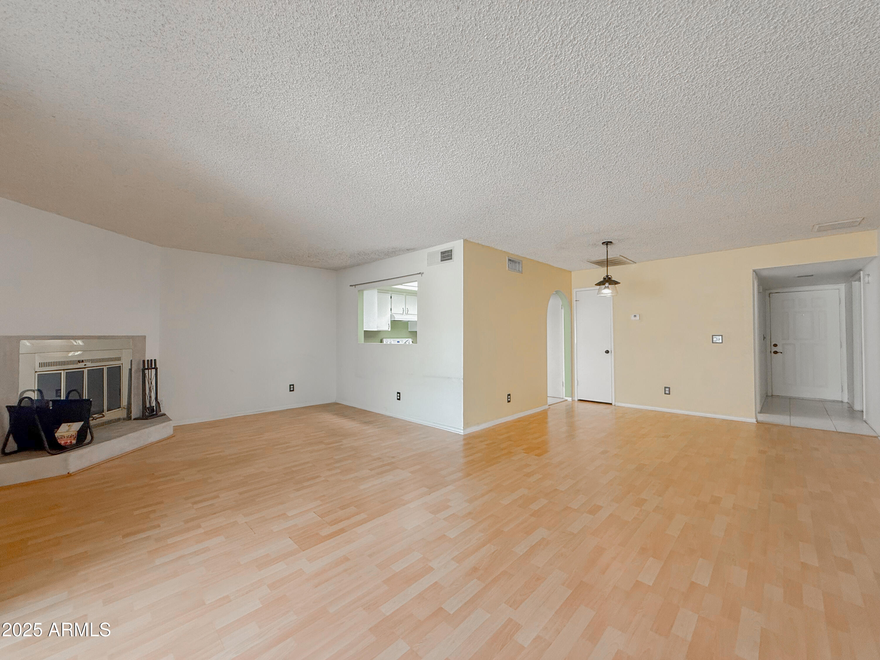 850 West Duke Drive Tempe, AZ 85283 - Photo 5 of 18 a view of an empty room with a window