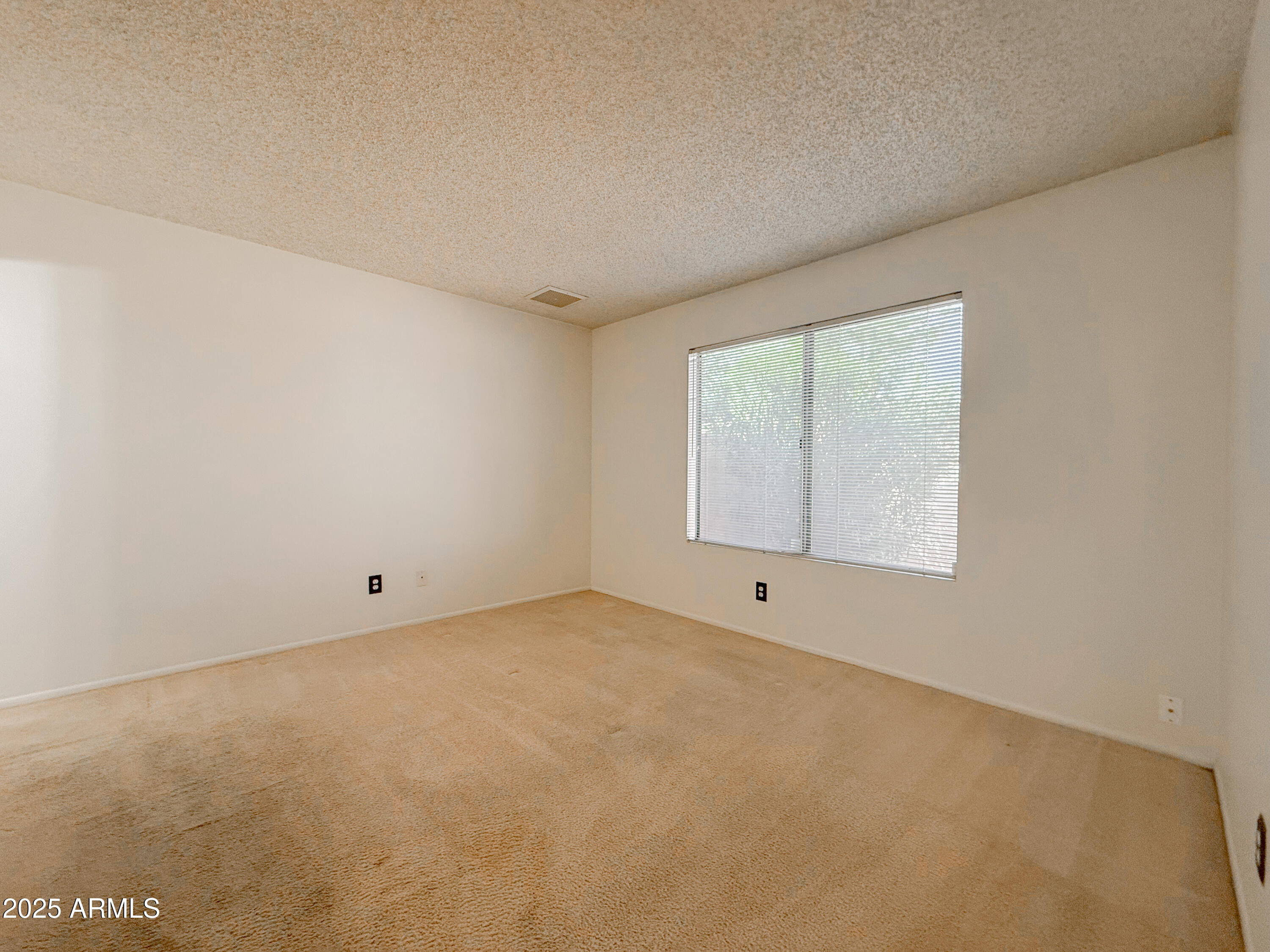 850 West Duke Drive Tempe, AZ 85283 - Photo 10 of 18 an empty room with a window