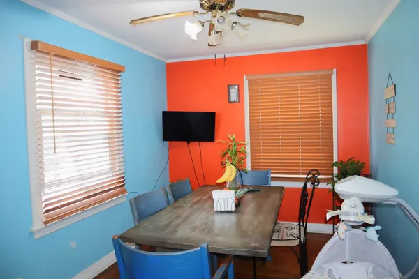 a view of a dining room with furniture window and outside view