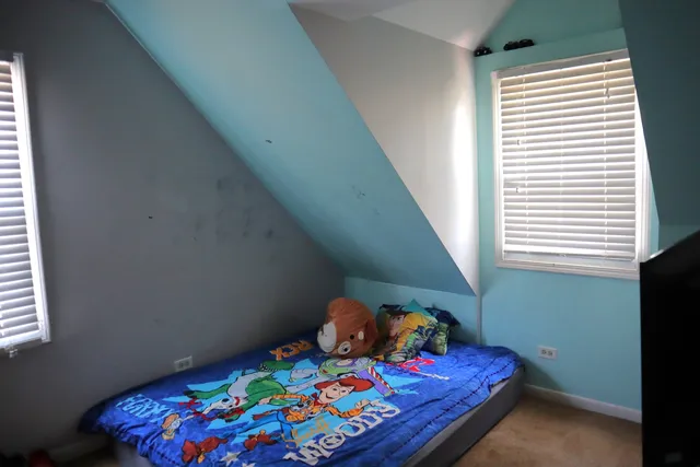 a room with toys and wooden floor