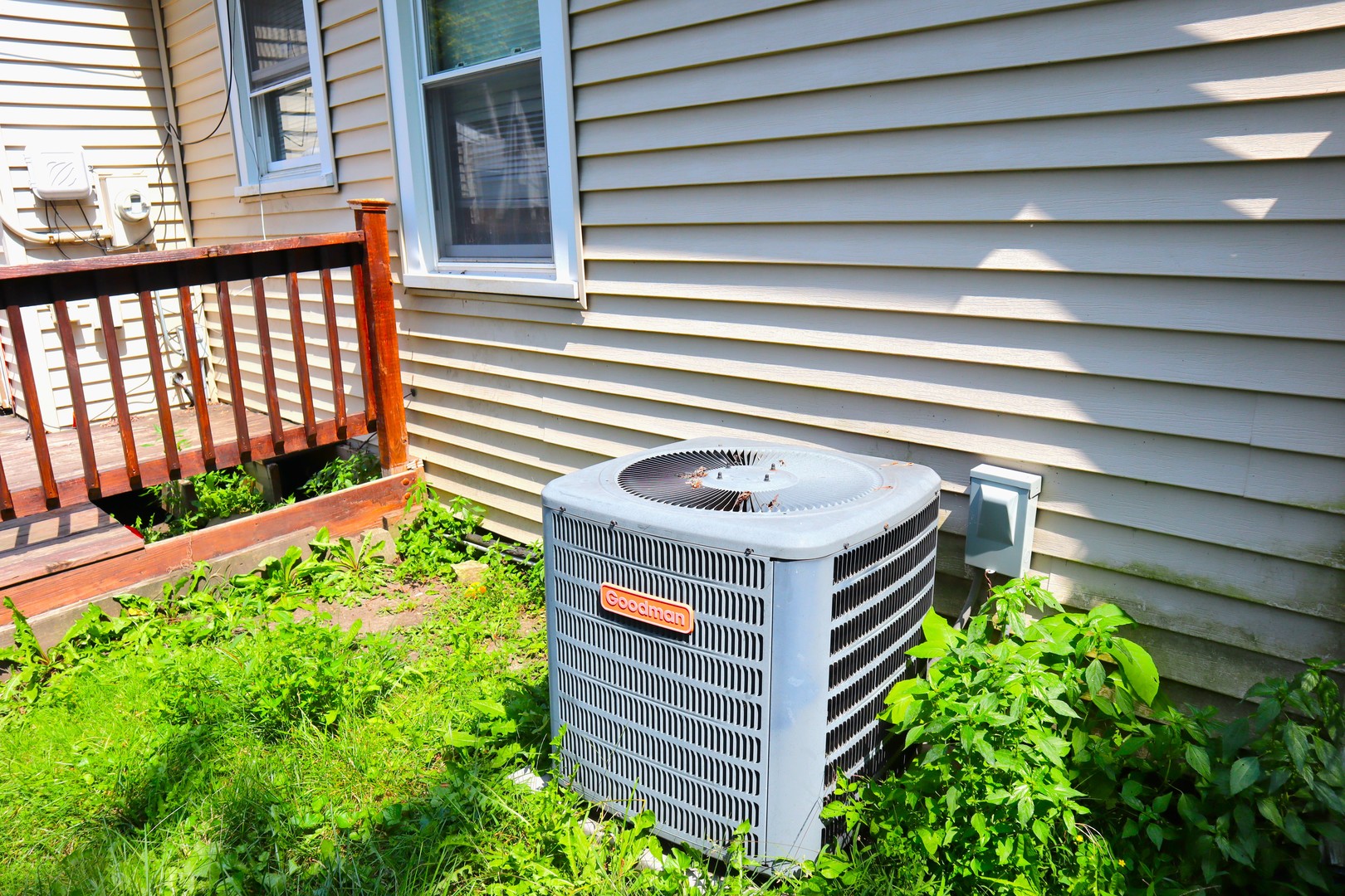15634 Ridgeway Avenue Markham, IL 60428 - Photo 27 of 30 a front view of a house with a garden
