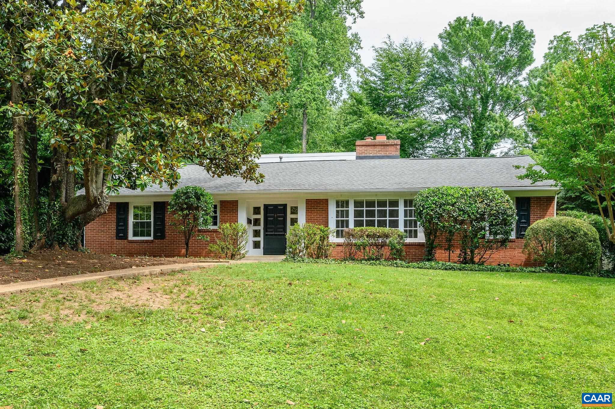 906 Old Farm Road Charlottesville, VA 22903 - Photo 1 of 46 a front view of a house with a yard