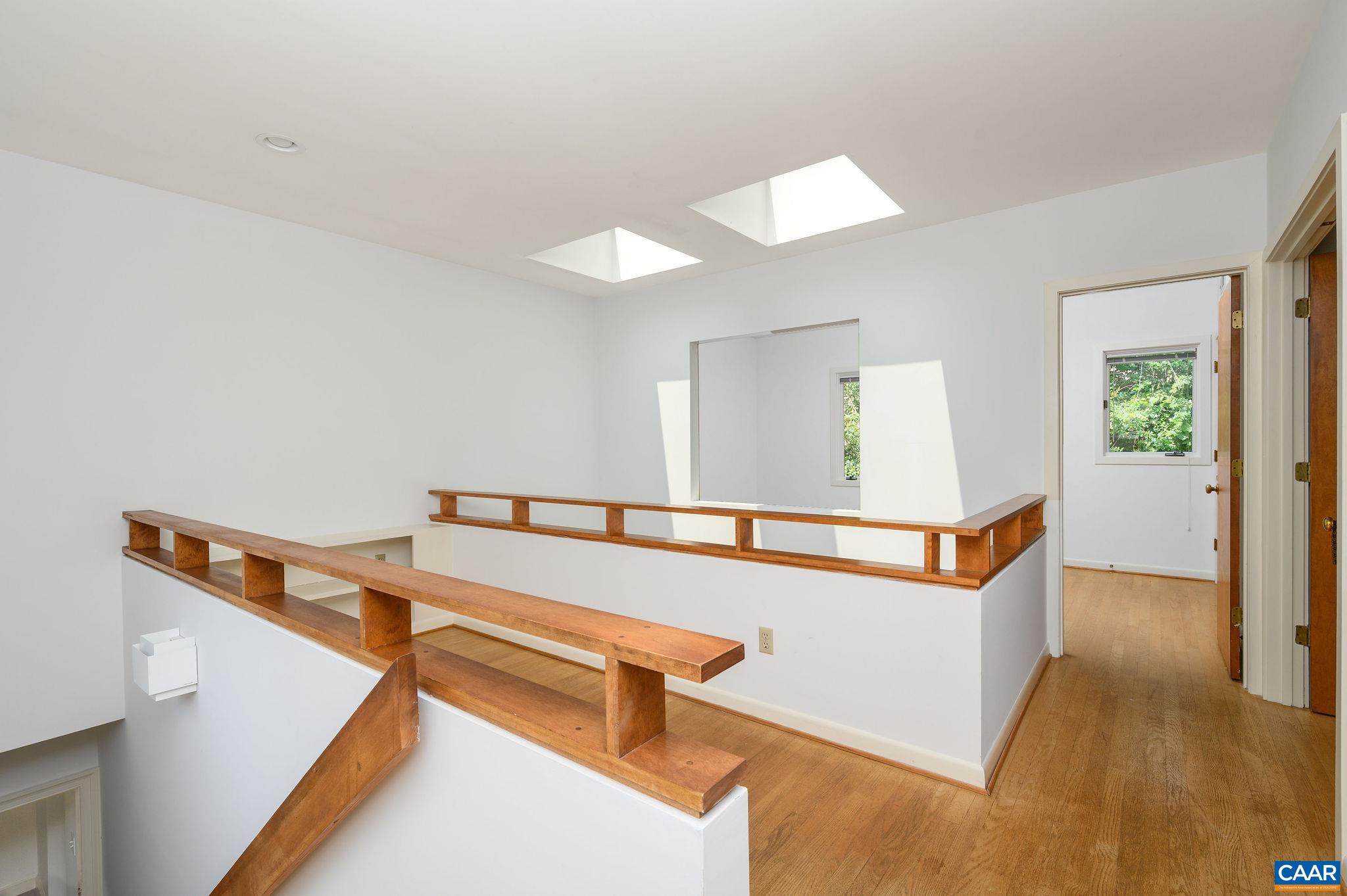 906 Old Farm Road Charlottesville, VA 22903 - Photo 15 of 46 wooden floor with an entryway