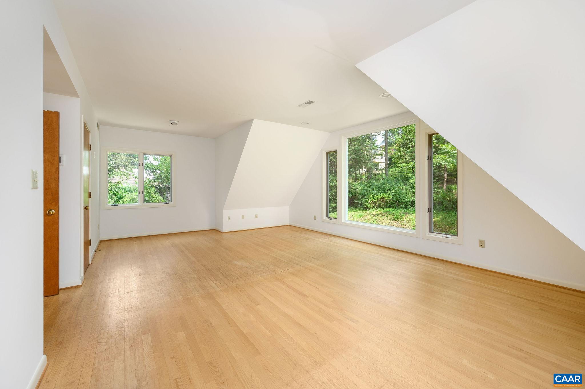 906 Old Farm Road Charlottesville, VA 22903 - Photo 19 of 46 wooden floor in an empty room with a window
