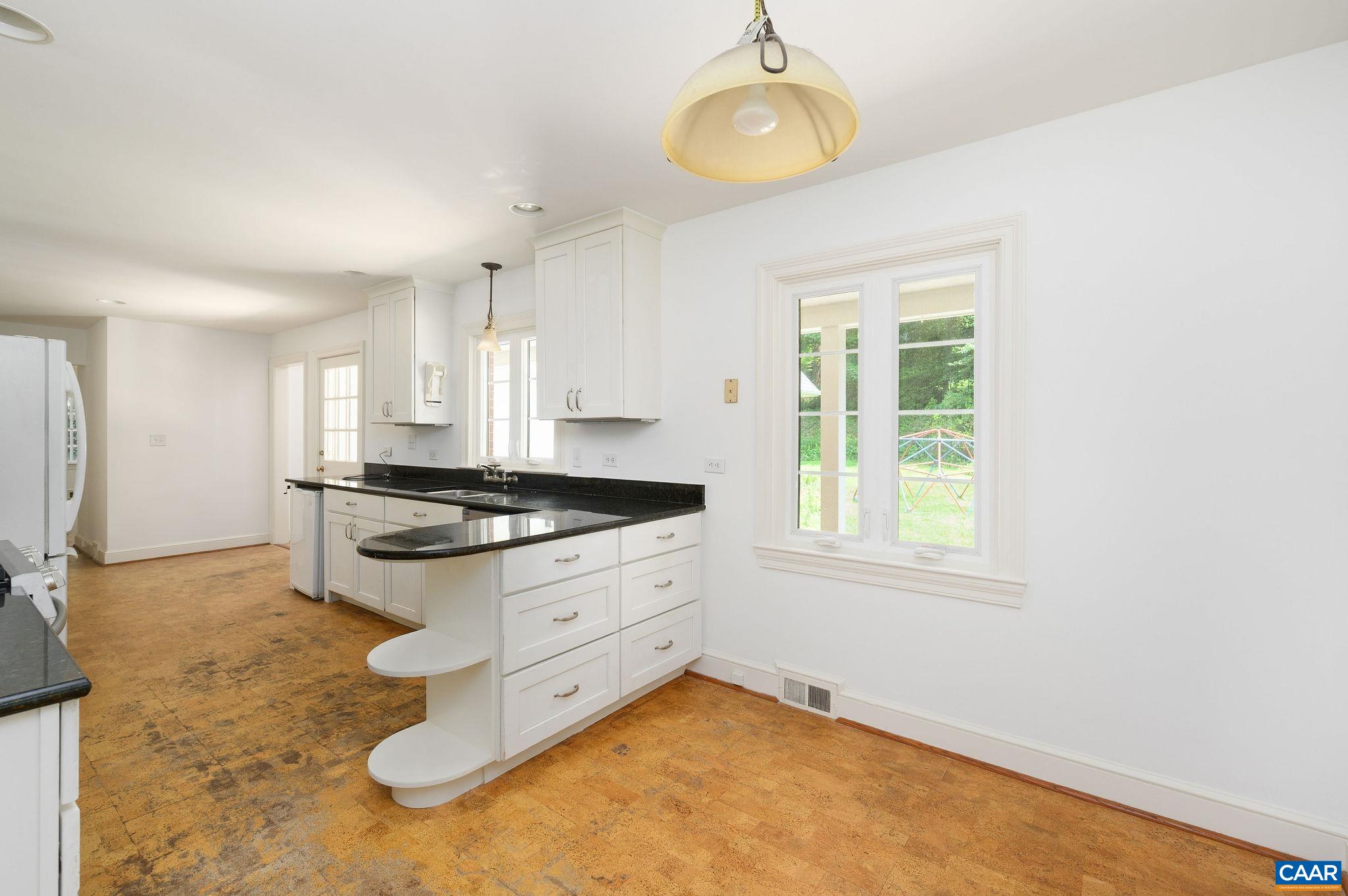 906 Old Farm Road Charlottesville, VA 22903 - Photo 10 of 46 a kitchen with stainless steel appliances granite countertop a granite counter tops and a window
