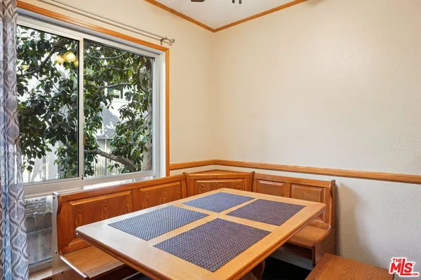 a view of a room with a large window