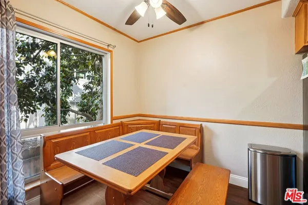 a view of a room with a large window