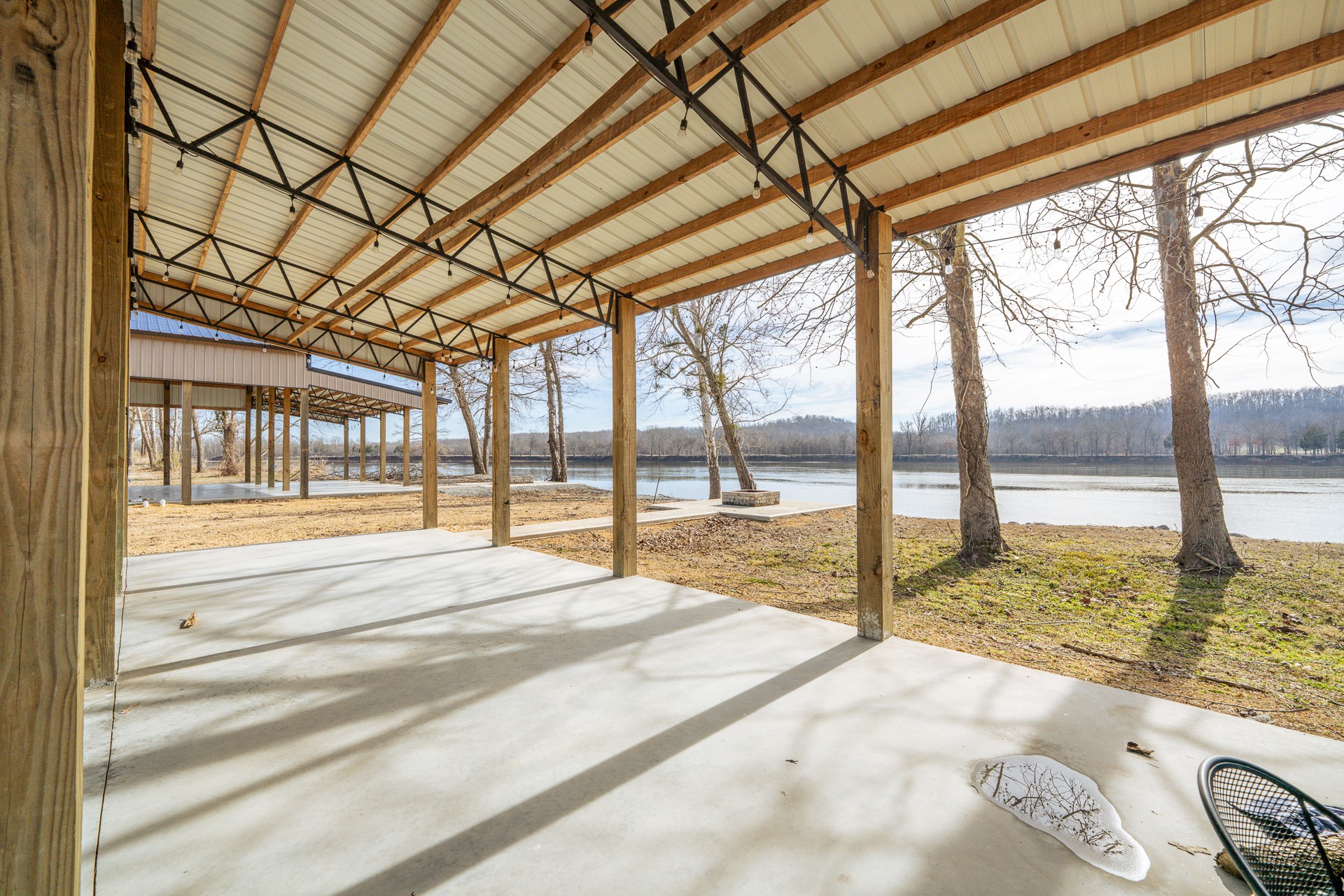 235 Hardin Bottom River Road Clifton, TN 38425 - Photo 13 of 42 a view of swimming pool with a porch