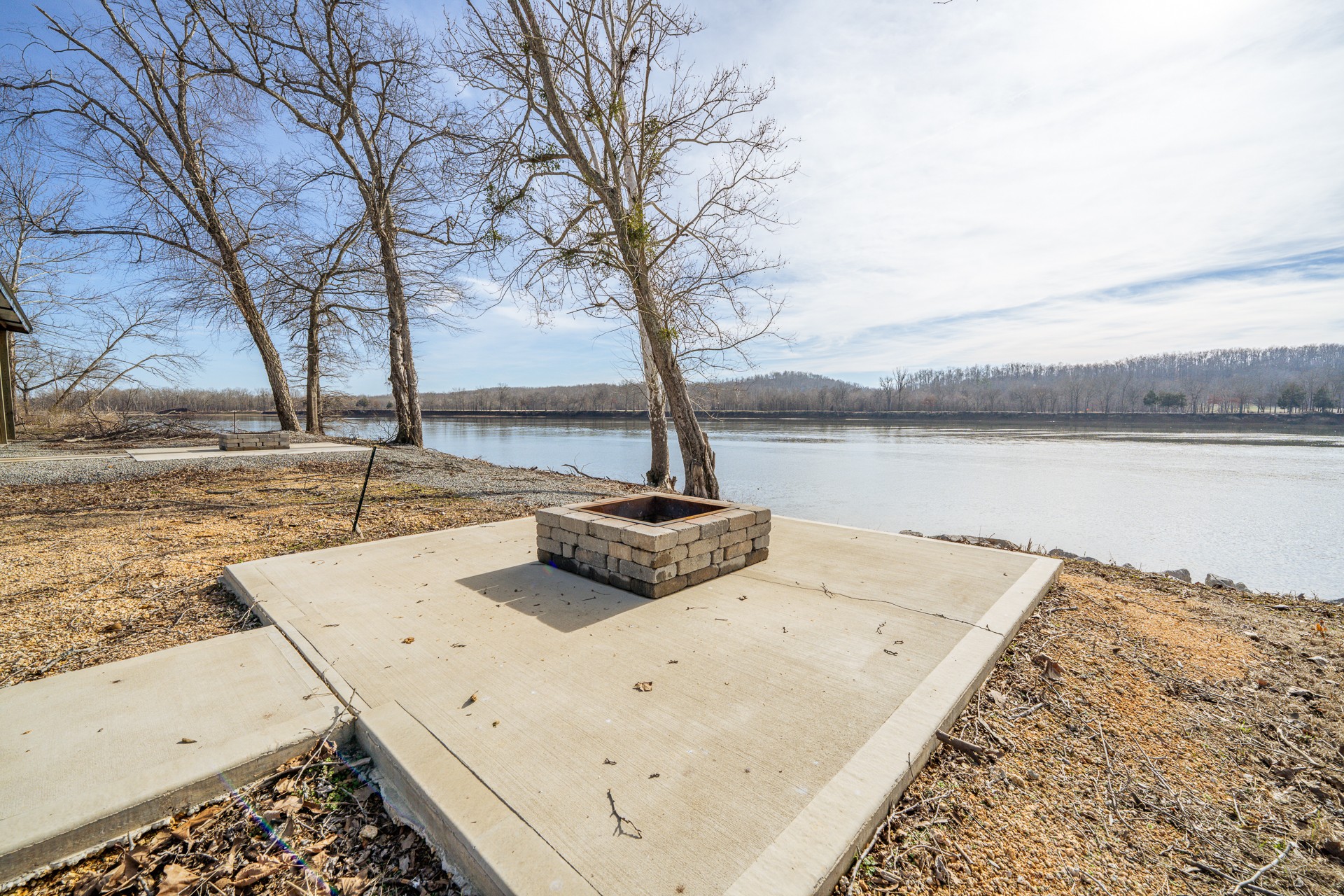 235 Hardin Bottom River Road Clifton, TN 38425 - Photo 23 of 42 a view of a lake with a mountain