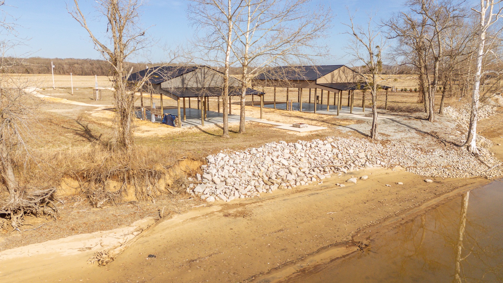 235 Hardin Bottom River Road Clifton, TN 38425 - Photo 33 of 42 a view of a yard with snow on the road