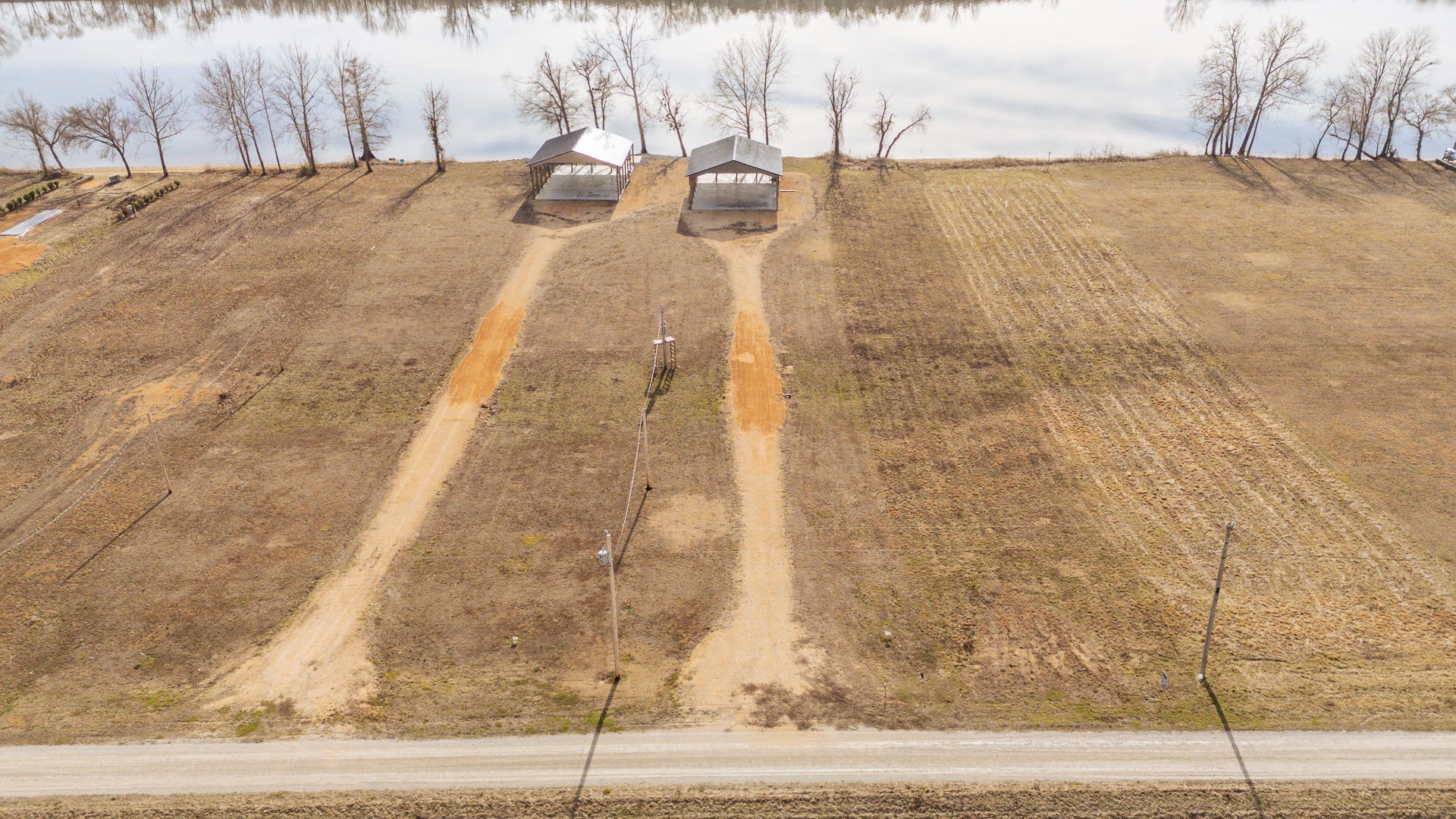235 Hardin Bottom River Road Clifton, TN 38425 - Photo 38 of 42 a potted plant sitting on the side of a road