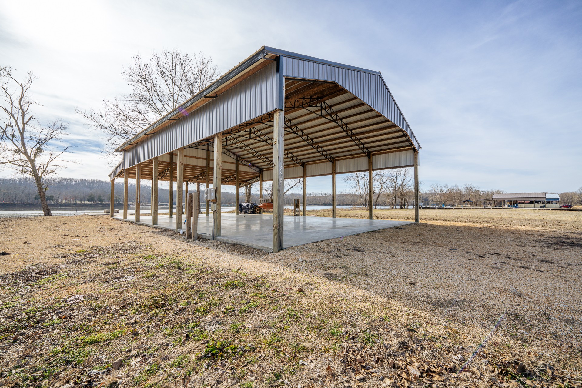 235 Hardin Bottom River Road Clifton, TN 38425 - Photo 7 of 42 a view of a backyard with wooden fence