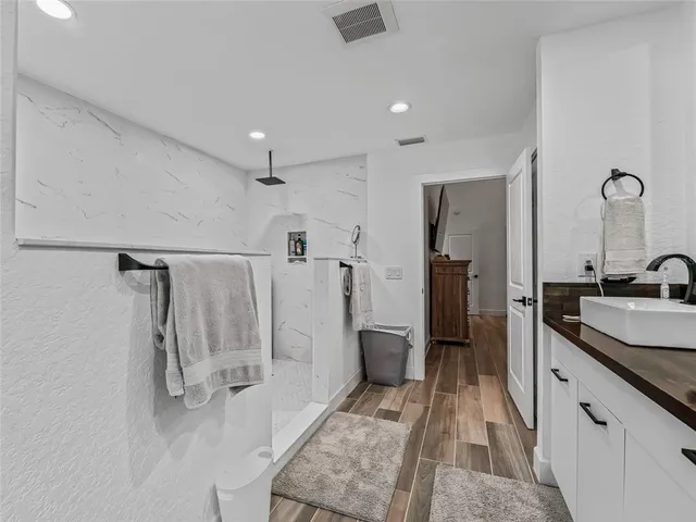 a room with furniture and wooden floor