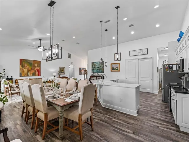 a view of a dining room with furniture