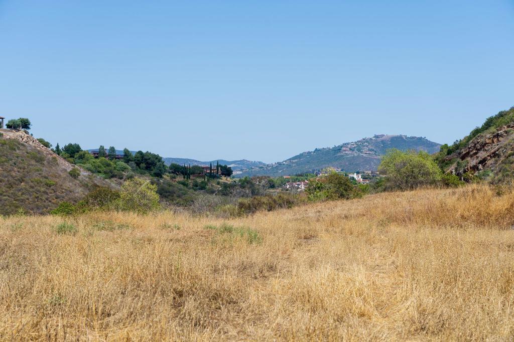 18096 Loma Alegre Rancho Santa Fe, CA 92067 - Photo 16 of 21 a view of lake with mountain