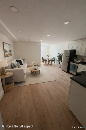 a living room with furniture and a couch