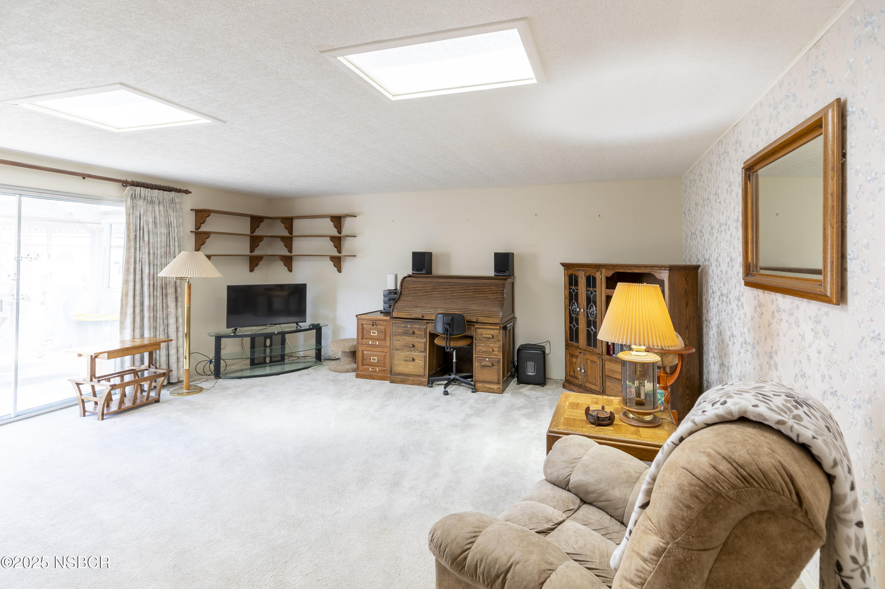 3361 Via Elba Lompoc, CA 93436 - Photo 27 of 40 a living room with furniture and a fireplace