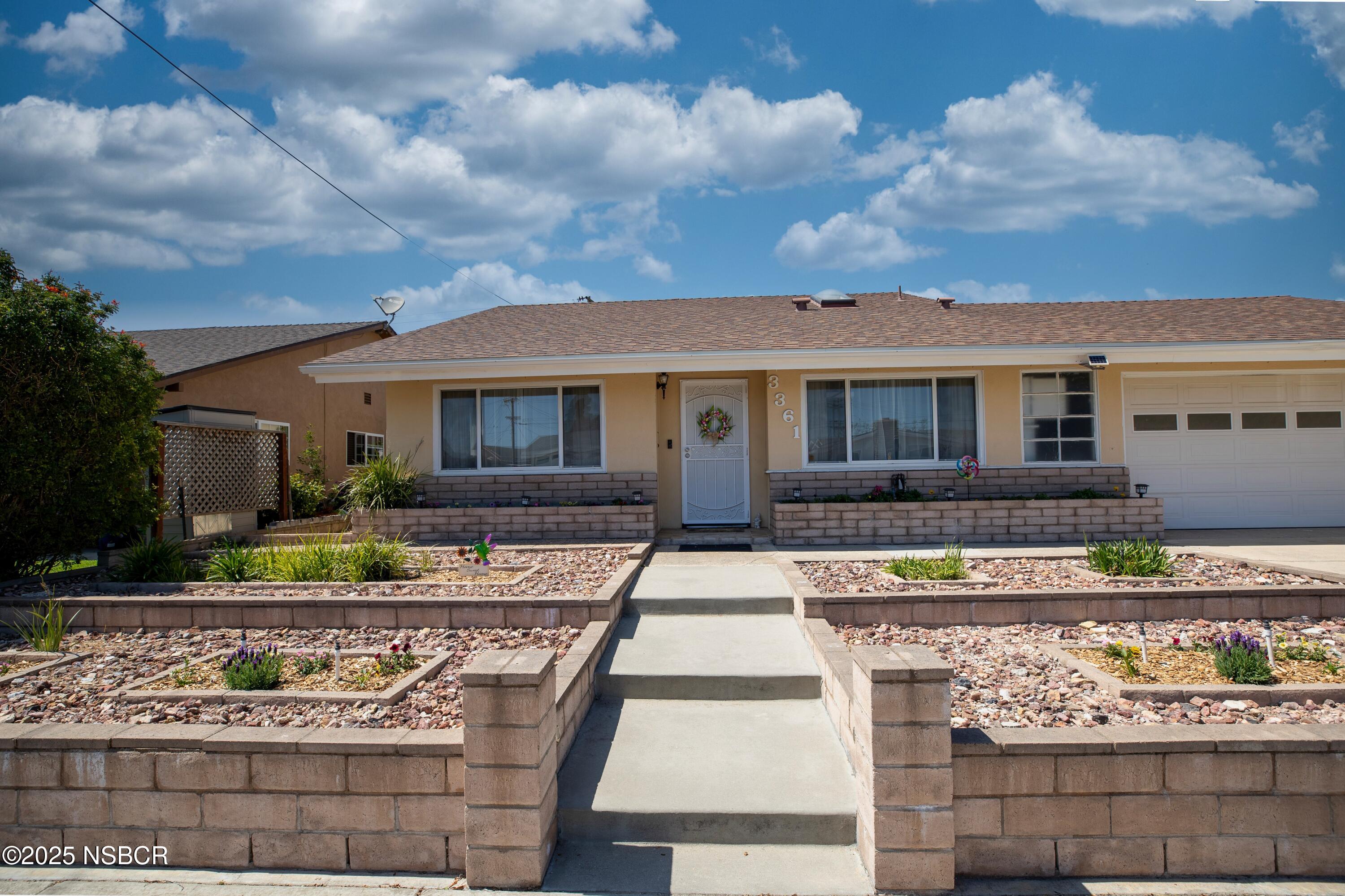 3361 Via Elba Lompoc, CA 93436 - Photo 3 of 40 a front view of a house with garden