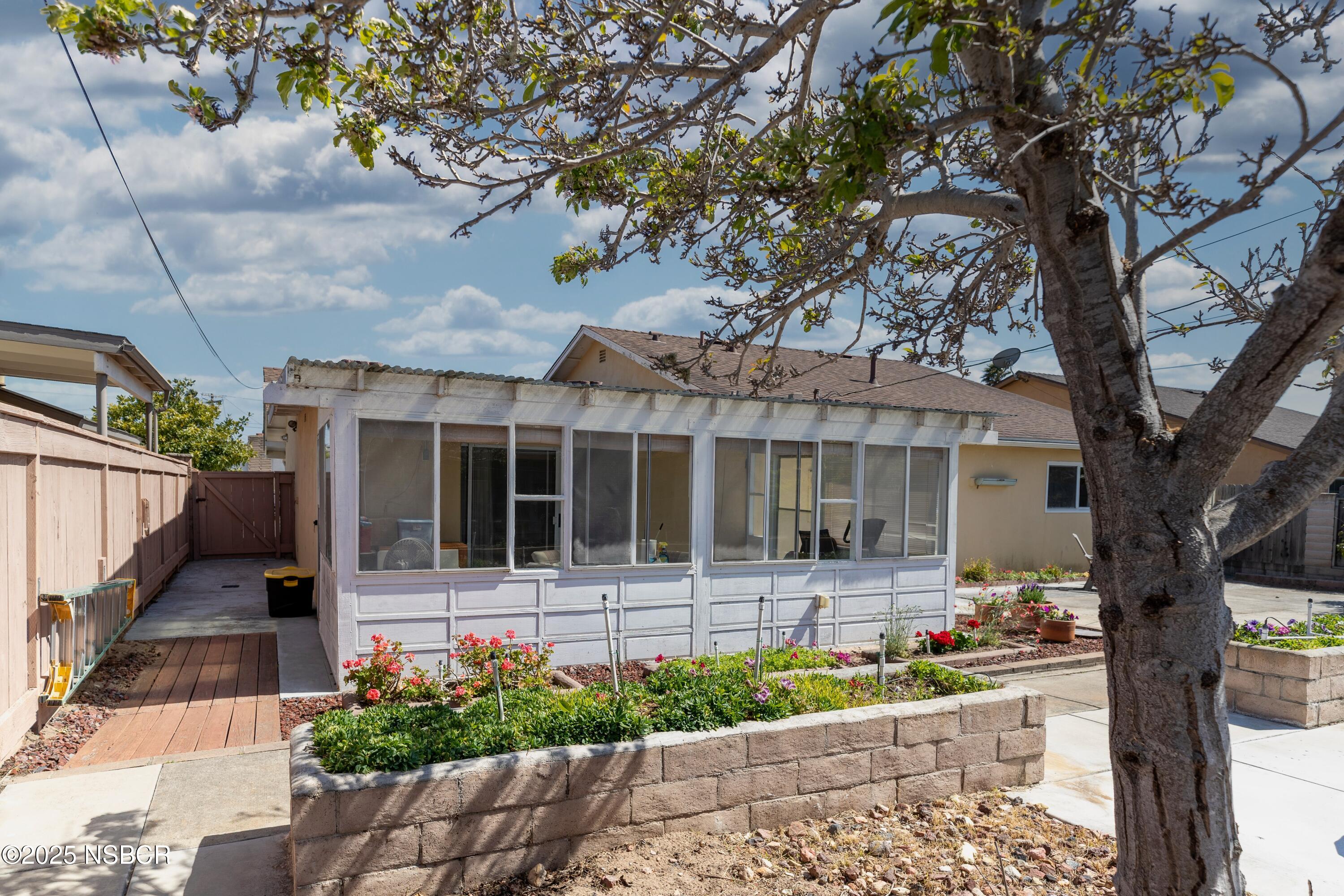 3361 Via Elba Lompoc, CA 93436 - Photo 37 of 40 a front view of a house with garden