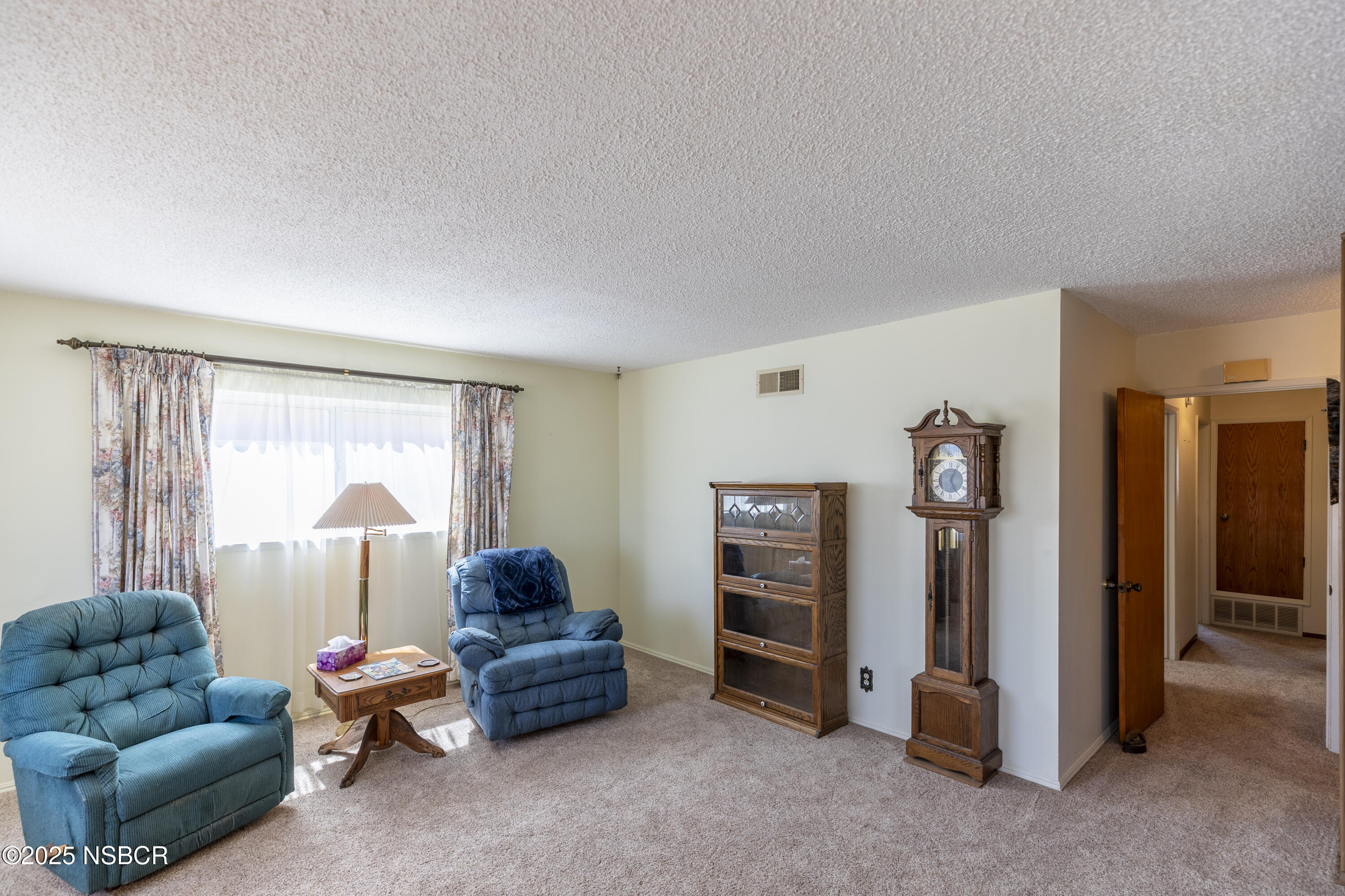 3361 Via Elba Lompoc, CA 93436 - Photo 4 of 40 a living room with furniture and a window